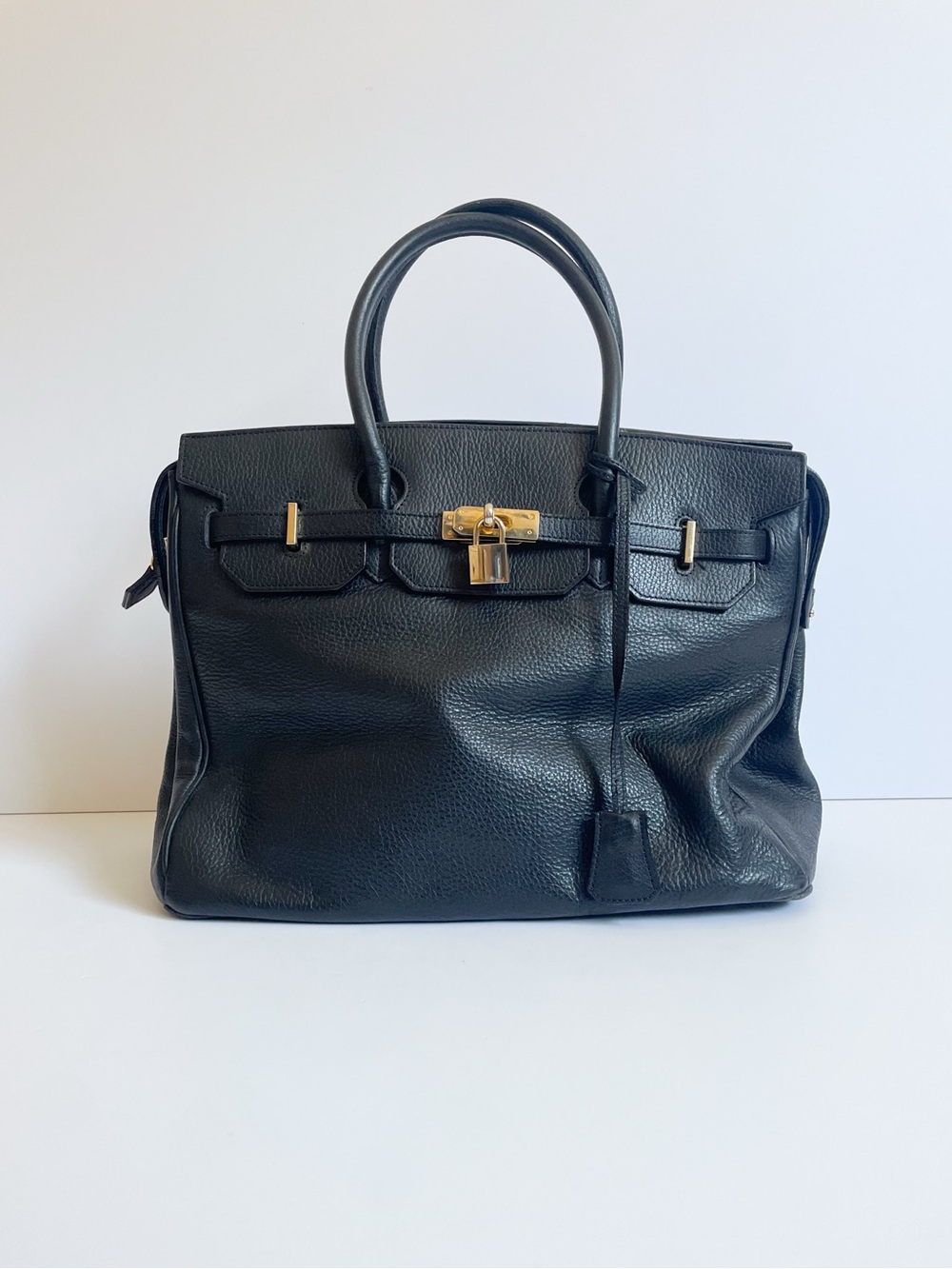 Elegant Black Leather Satchel with Gold Hardware